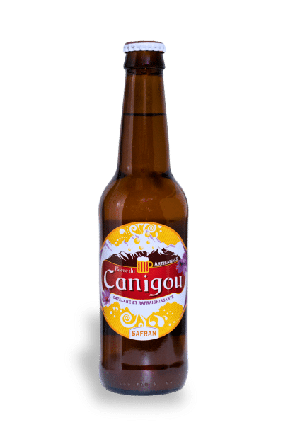 Bouteille en verre brun de Bière du Canigou artisanale avec étiquette jaune, mention "Canigou" et "Safran".